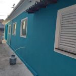 Pintura de fachada de casa depois de pintar